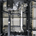 Close-up of vehicle suspension system with various components.