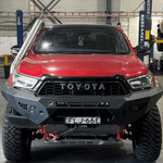 Red Toyota truck in a garage setting