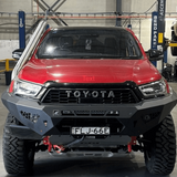 Red Toyota truck in a garage setting