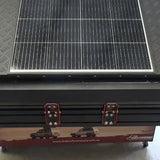 Solar panel on a black roof top tent