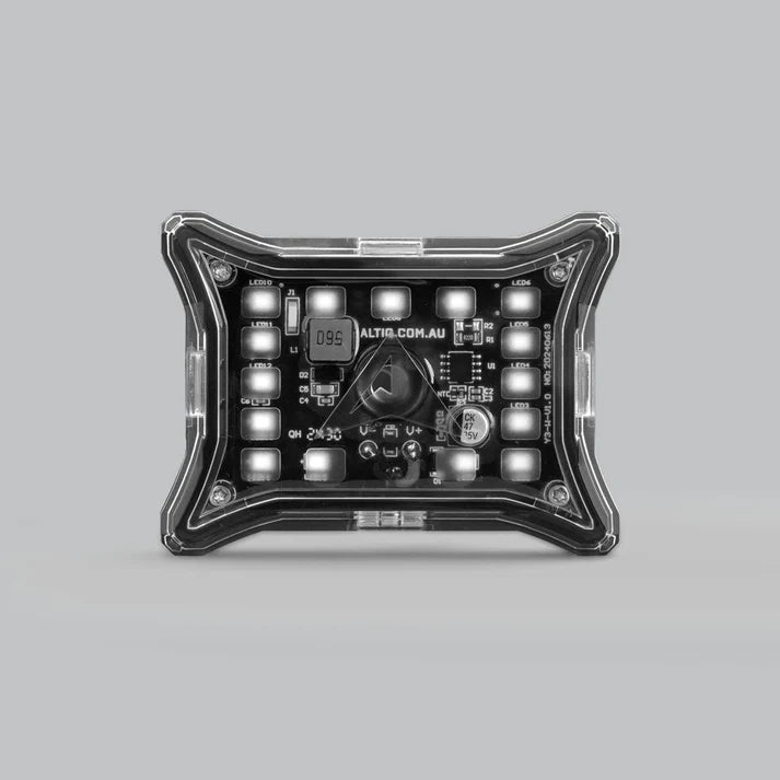 ALTIQ Spectrum Pro rock light seen square on from above, the black moulded frame around the clear lens with the LED board and its wiring visible through it