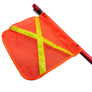 Close-up of the orange mesh safety flag on the whip, yellow reflective tape crossing it diagonally and the red fibreglass shaft threaded through the sleeve