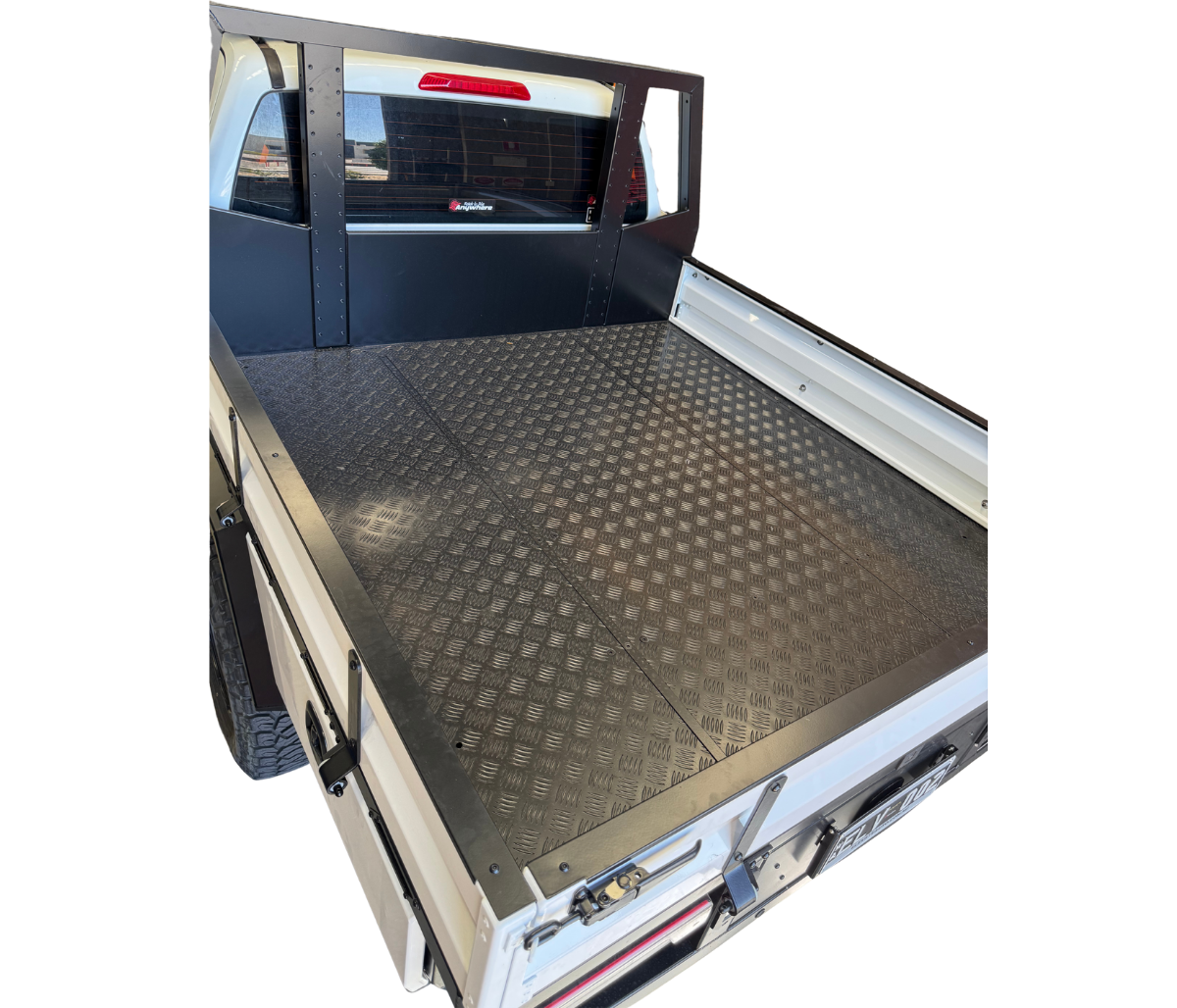 Empty truck bed with a checkered floor pattern on a white background
