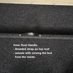 Close-up of a black inner roof handle on a tent with text description.
