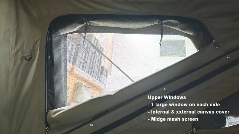 Window of a tent with text describing features, showing a building outside.