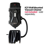 K21 wall-mounted vacuum cleaner with coiled hose on a white background