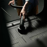 Person using Blahst K21 Wall-Mounted Vacuum