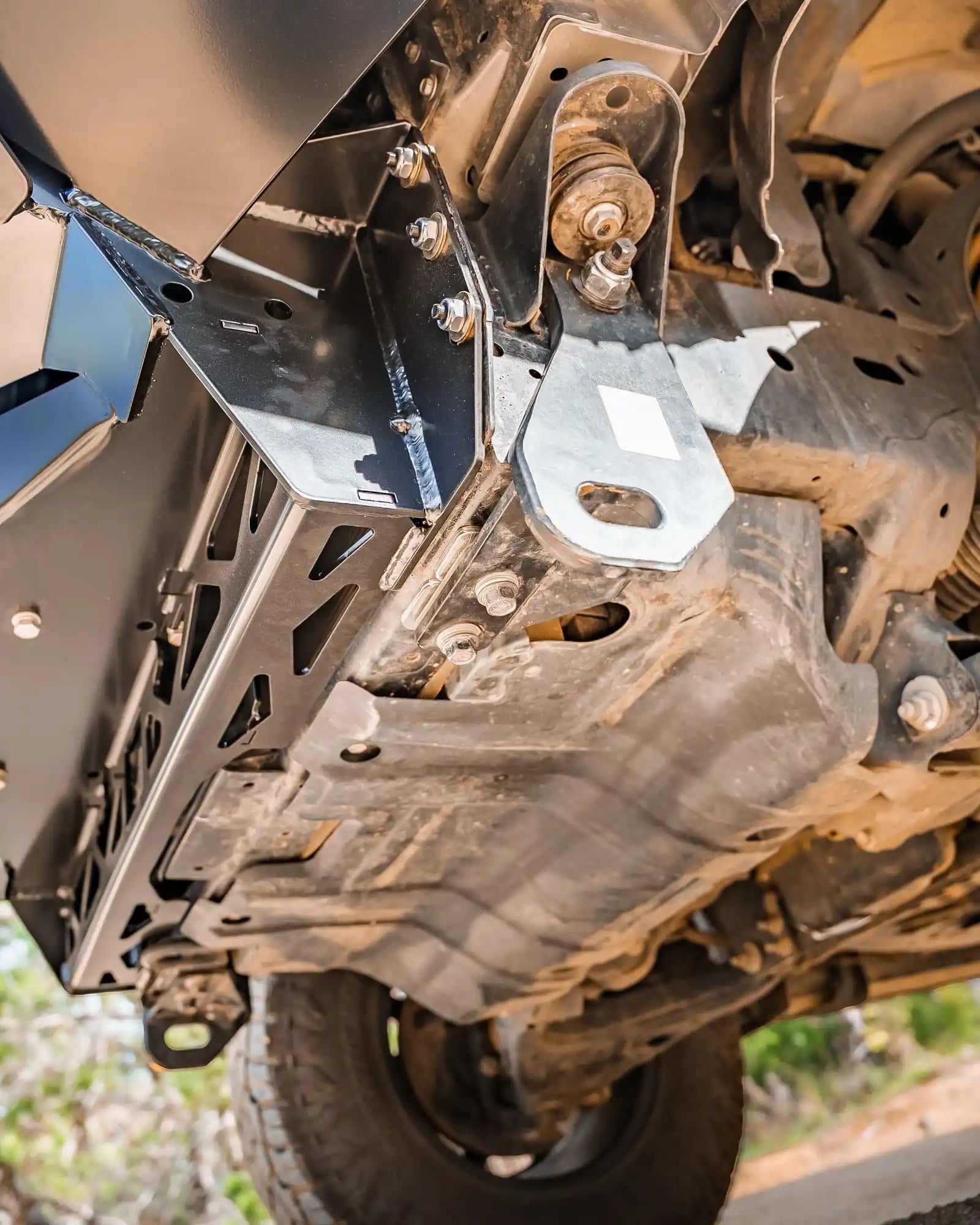Close-up of a vehicle's undercarriage with suspension components