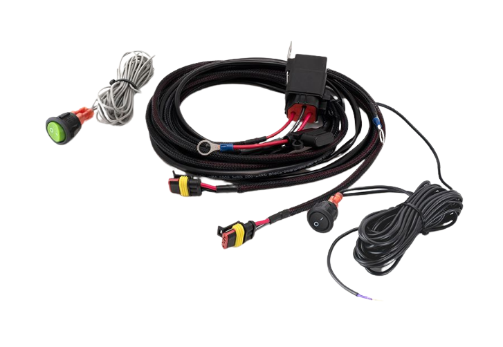An assortment of Lazerlamps wiring kits including various connectors, cables, a relay, and fuses.