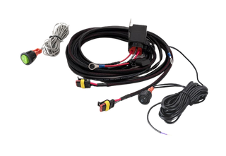 An assortment of Lazerlamps wiring kits including various connectors, cables, a relay, and fuses.