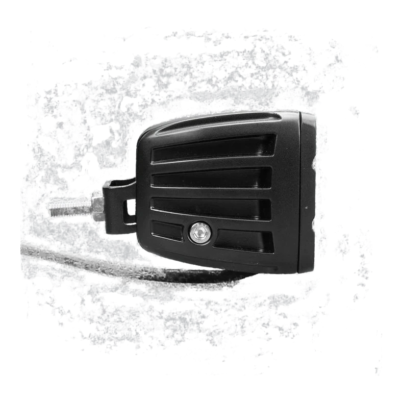 DX4 work light side on, the ribbed housing profile with the mounting bracket bolted through the flank and the cable running forward