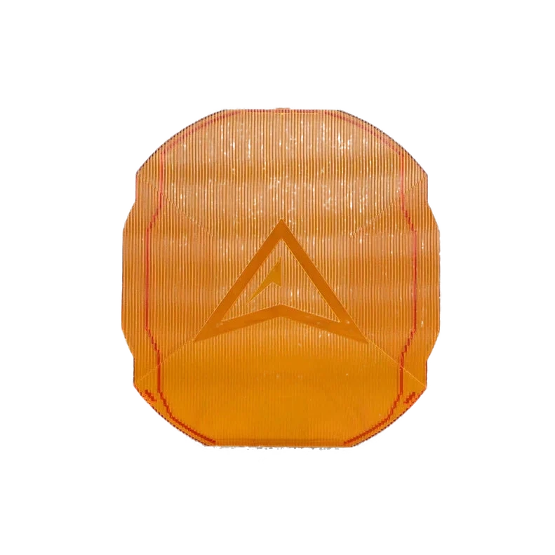 Amber ALTIQ Rogue panoramic lens cover, translucent orange with fine vertical ribbing and the raised Rogue chevron moulded into the centre