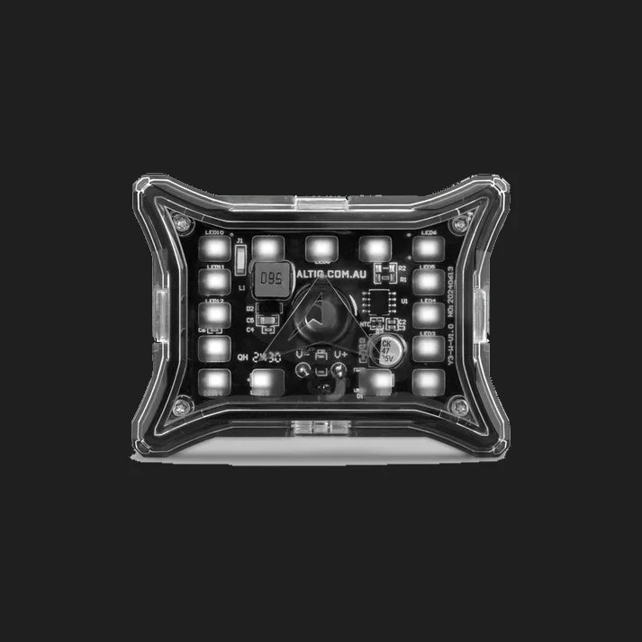 ALTIQ Spectrum Pro rock light seen square on from above, the black moulded frame around the clear lens with the LED board and its wiring visible through it