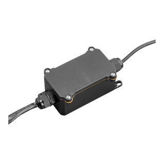Sealed control box for the rock light kit, a black moulded housing with a screwed-down lid, an orange gasket line around the seam, cable glands at each end and a mounting lug on one corner