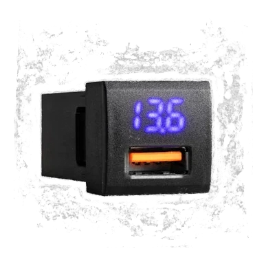 ALTIQ panel-mount USB 3.0 voltmeter module with a blue seven-segment display reading 13.6, shown at an angle against grey