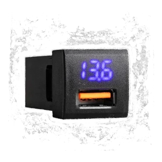 ALTIQ panel-mount USB 3.0 voltmeter module with a blue seven-segment display reading 13.6, shown at an angle against grey