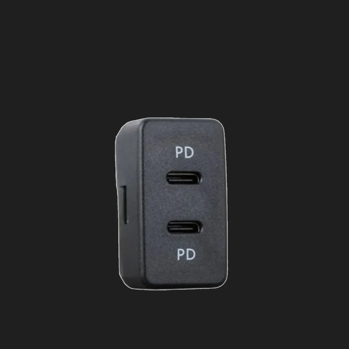 Toyota-fit dual USB-C charger, the black face carrying two USB-C ports each marked PD, with the body extending back behind the panel