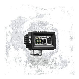 ALTIQ CX2 work light face on, the ALTIQ name on the left cheek of the housing and a rectangular reflector holding a block of six LEDs