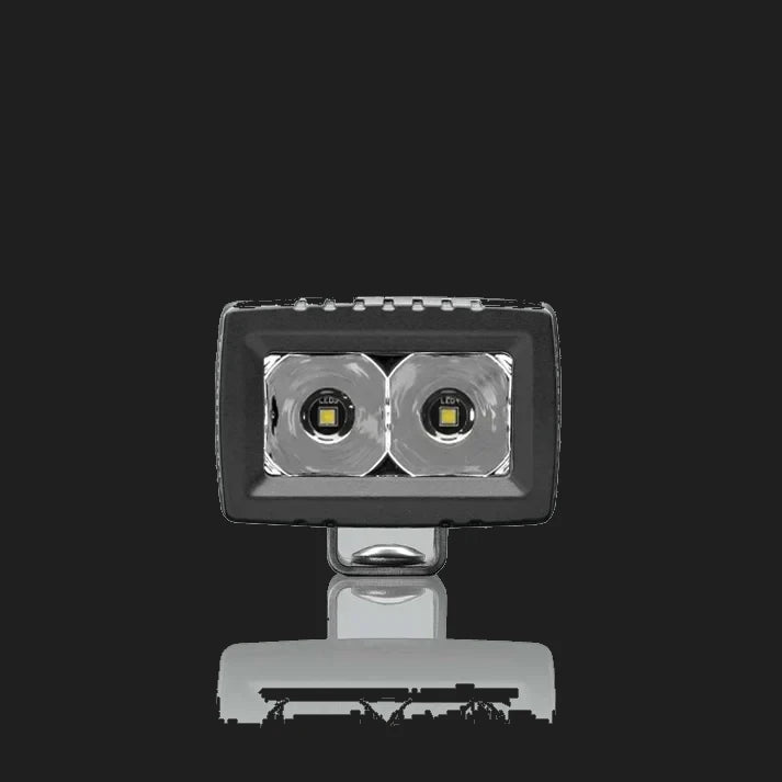 ALTIQ CX2 spot work light square on to the lens, the two deep polished spot reflectors filling the aperture with the mounting bracket beneath
