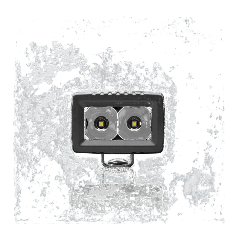 ALTIQ CX2 spot work light square on to the lens, the two deep polished spot reflectors filling the aperture with the mounting bracket beneath