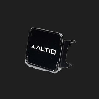 Black DX4 blackout cover at a three-quarter angle, the ALTIQ name and arrow on the gloss face with one side skirt turned toward the camera