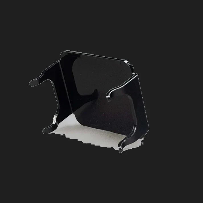Black DX4 blackout cover seen from behind and above, the gloss panel with its side skirts and the four moulded retaining clips