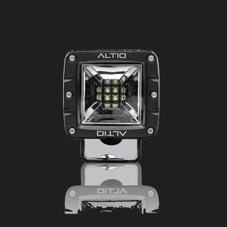 ALTIQ DX4 Scene work light in black, a square reflector holding nine LEDs behind a clear lens with the ALTIQ name above and below