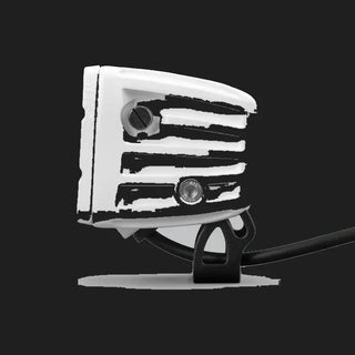 White DX4 Scene work light in profile from the rear, the ribbed white housing with two adjustment screws and the black bracket beneath carrying the lead