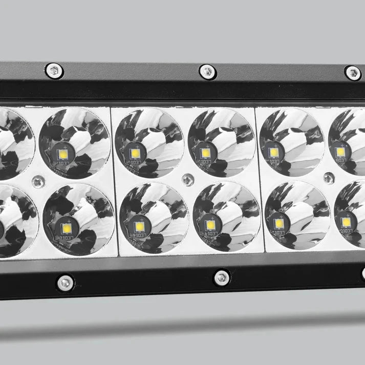 Close-up across the spot section of the double row bar, two rows of LEDs each seated in a deep polished reflector behind the lens