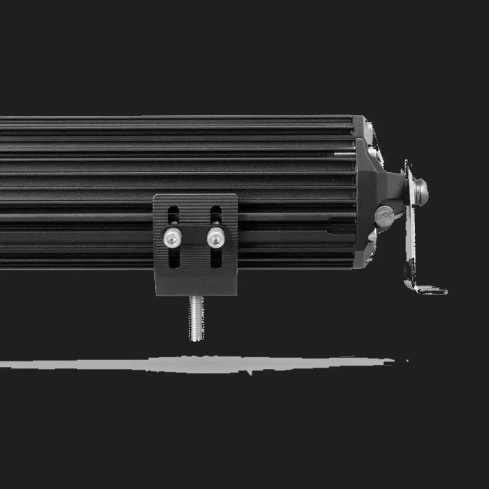 Back of the double row bar, showing the extruded finned housing, a sliding mounting block with its threaded stud, and the end bracket with its pivot bolt