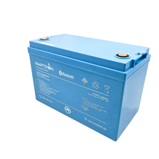 The Amptron 150Ah battery from a front corner, showing the depth of the blue case, the recessed brass terminals on top and the specification label on the front face