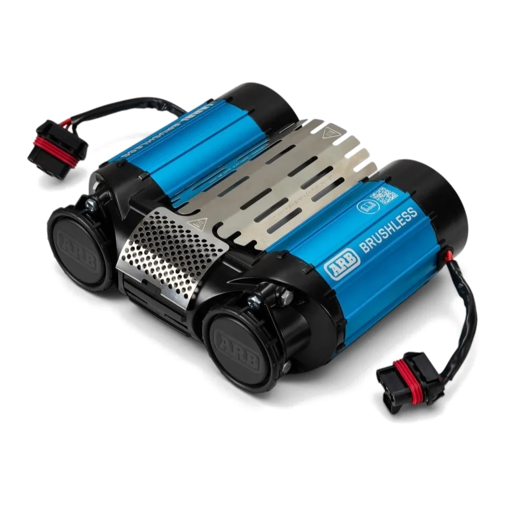 ARB brushless twin on-board compressor from above at an angle, showing the blue cylinders, stainless vented cover and wiring connectors
