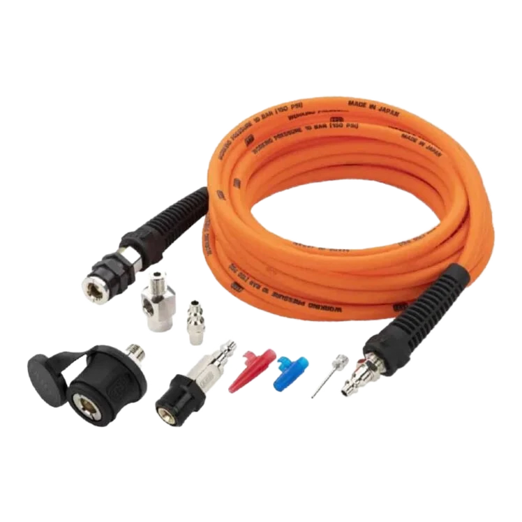ARB pump up kit laid out: an orange air hose rated 10 bar 150 psi made in Japan with moulded strain reliefs at both ends, a quick release coupling with dust cap, a straight adaptor, two quick connect nipples, red and blue tyre deflator tools and a chuck
