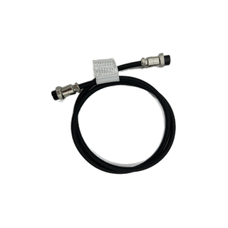 The 1 metre BluEdge parallel communication cable coiled, with a screw-lock aviation connector at each end and the pin-out label wrapped around the lead