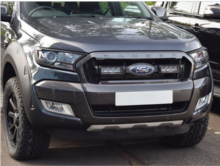 Front view of a Ford Ranger truck with Lazer Lamps Grille Kit (2016–2018) and clear background