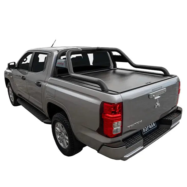 Gray pickup truck with a tonneau cover on a white background