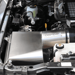 Close-up of a car engine with a torqit Airbox system.