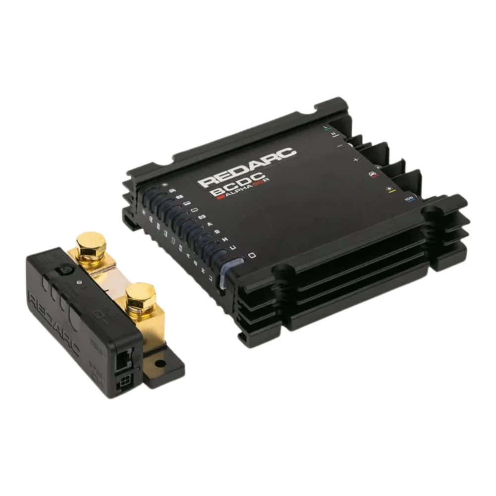 Redarc BCDC Alpha50 R battery manager at an angle with its sense module in front, the finned black case carrying the REDARC and BCDC Alpha50 R markings and the input icons down the side
