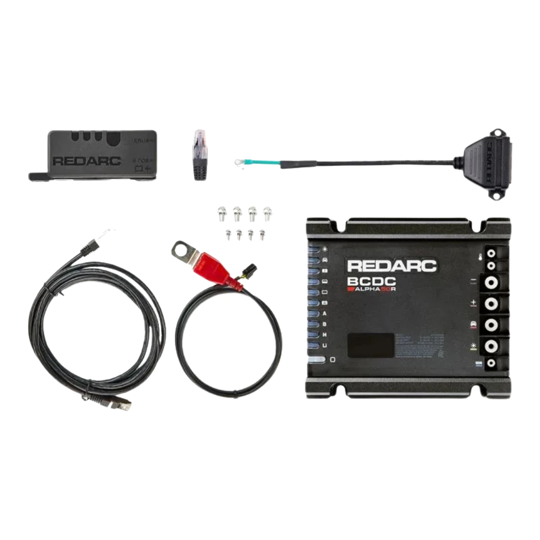 Everything in the Alpha50 R box laid out: the battery manager itself, the sense module, an RJ45 network lead, a battery lead with red ring terminal and in-line fuse, a green sense lead with ring terminal, four mounting screws, a brass terminal bolt and a spare RJ45 plug