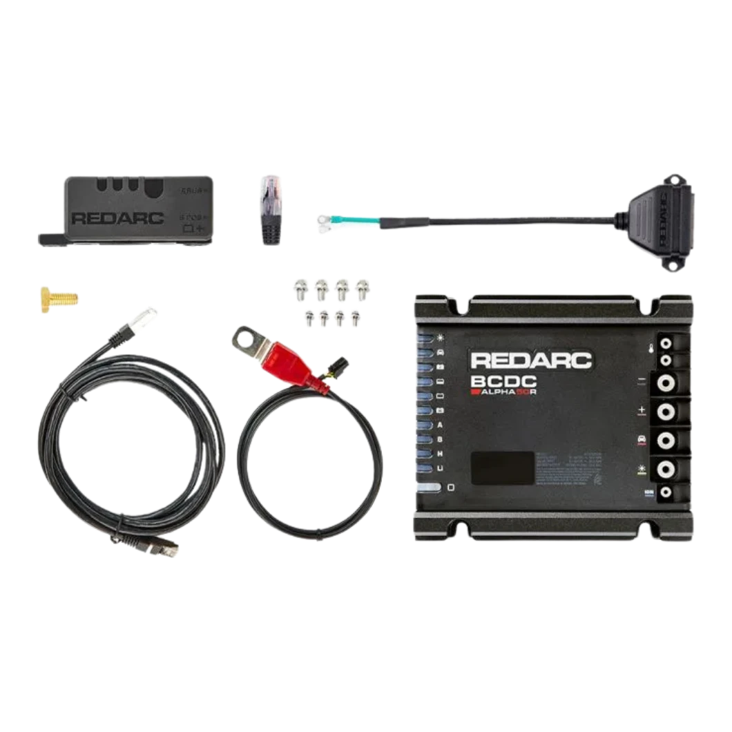 Everything in the Alpha50 R box laid out: the battery manager itself, the sense module, an RJ45 network lead, a battery lead with red ring terminal and in-line fuse, a green sense lead with ring terminal, four mounting screws, a brass terminal bolt and a spare RJ45 plug