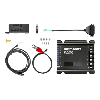 Everything in the Alpha50 R box laid out: the battery manager itself, the sense module, an RJ45 network lead, a battery lead with red ring terminal and in-line fuse, a green sense lead with ring terminal, four mounting screws, a brass terminal bolt and a spare RJ45 plug