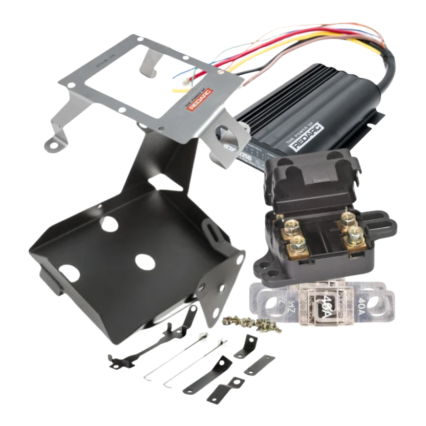 Under bonnet dual battery kit for the Toyota LandCruiser laid out: REDARC BCDC1225D charger with wiring loom, stainless charger bracket, black battery tray, twin midi fuse holder, 40A midi fuses and mounting hardware