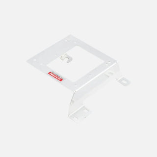 White Redarc mounting bracket at a shallow angle, a plate with a central cut-out, a hooked retaining tab and two slotted mounting feet