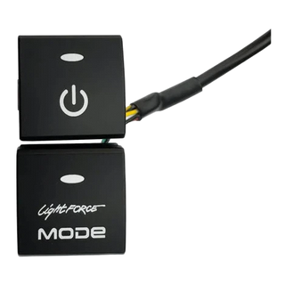 Two-position Lightforce switch blank set, an upper button with a power symbol and a lower blank carrying the Lightforce MODE name, with the wiring loom leaving the back