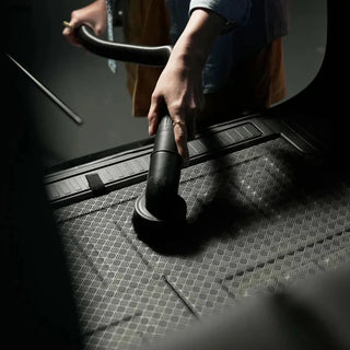 Person using Blahst K21 Wall-Mounted Vacuum