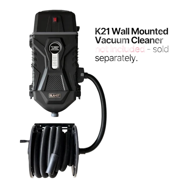 K21 wall-mounted vacuum cleaner with coiled hose on a white background