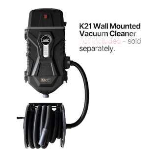 K21 wall-mounted vacuum cleaner with coiled hose on a white background