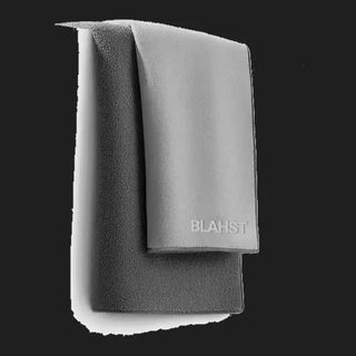 Gray towel with 'Blahst' branding on a white background