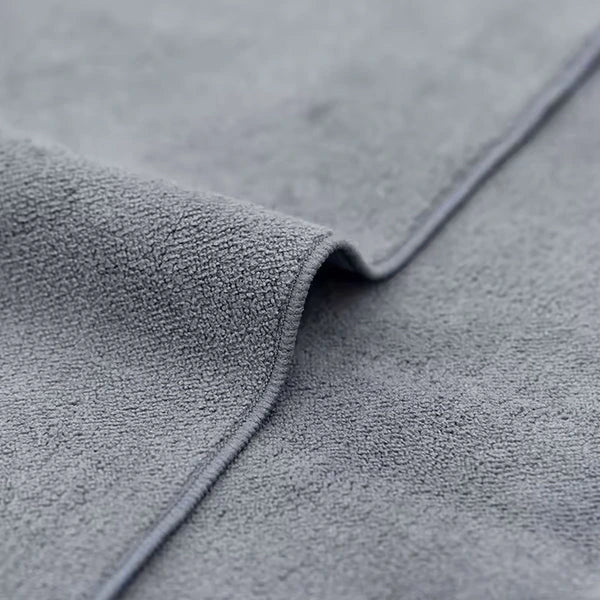 Close-up of gray textured fabric with a focus on texture and color – Blahst Microfibre Drying Towel