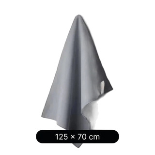 Gray towel hanging on a white wall with dimensions 125 x 70 cm displayed below.